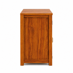 The RJ Art Sheesham Wood Bedside Table with Cane Panel Door and Open Shelf Storage