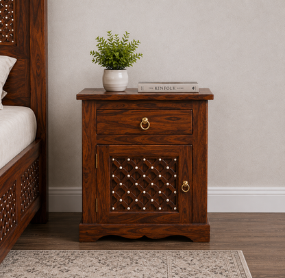 The RJ Art premium Sheesham wood bedside table with drawer storage, cabinet door, decorative carved panel design, and walnut finish.