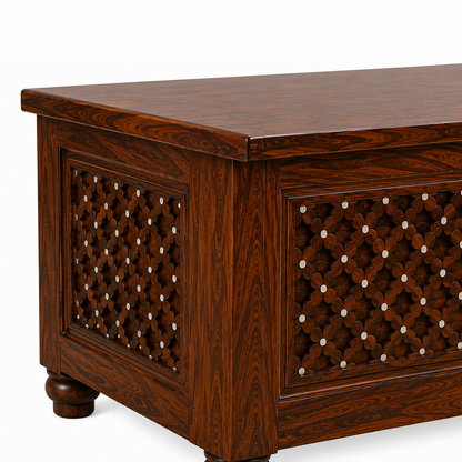 The RJ Art premium Sheesham wood coffee table with handcrafted decorative side panels, spacious tabletop, and rich walnut finish for modern living rooms.