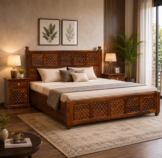 The RJ Art premium Sheesham wood king size bed with decorative carved headboard and footboard in a rich walnut finish.