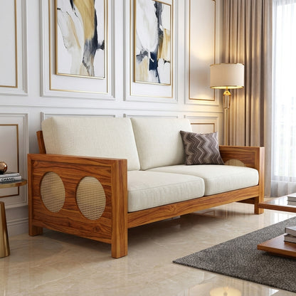 The RJ Art Sheesham Wood 2 Seater Sofa with Cane Panel Armrests and Cream Cushions